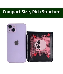 Compact black punk wallet with skull design shown next to a smartphone for size reference