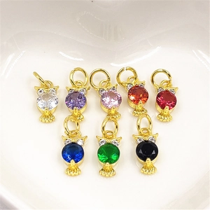 Exquisite owl pendants in assorted colors with micro-inlaid cubic zirconia on heart display
