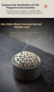 Zen style black ceramic incense burner featuring a maple leaf cutout lid and wisps of smoke