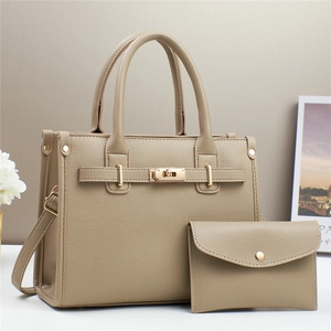 Fashionable khaki leather handbag and clutch set with gold twist lock and lychee texture
