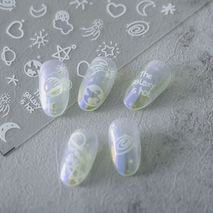 Glowy galaxy nail art stickers featuring holographic moon star and planet designs