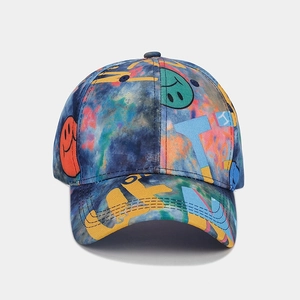 Macro view of street style baseball cap with colorful graffiti and smiley face detail