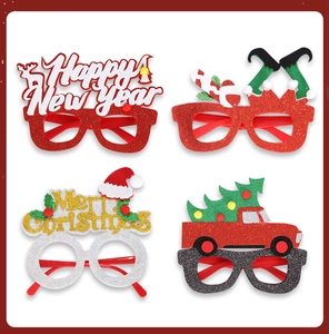Detail of Christmas glasses set including reindeer antlers and festive glitter frames