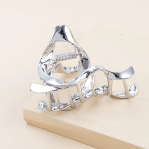 Irregular liquid silver hollow metal hair claw clip with sleek fluid design for women