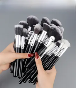 Close-up of 40-piece makeup brush set with black handles and dense gradient bristles