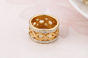 Close-up of gold hollow circle ring with double row of pavé cubic zirconia diamonds