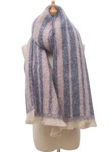 Detail of pink and blue striped wool blend scarf with beige fringe on a mannequin