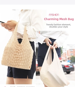 Detail of beige textured bubble bag with elastic pleated fabric shown in outdoor use