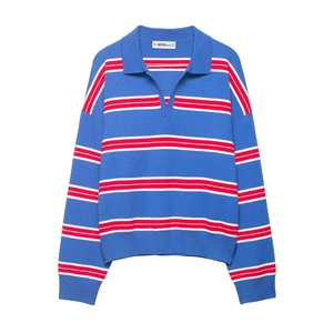 Detail of blue and white striped polo collar knitwear with high-quality ribbed texture