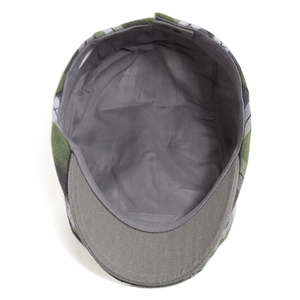 Classic green and grey plaid flat cap showing high-quality inner lining and stitching