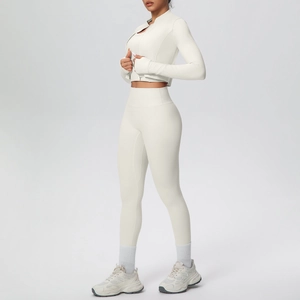 Detailed view of women's 3-piece yoga set with zip jacket, sports bra, and high-waist pants