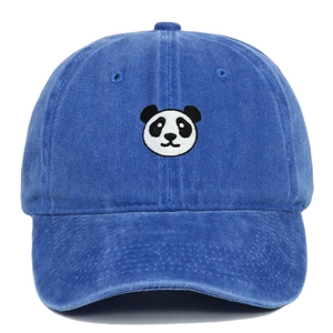 Close-up of blue washed cotton baseball cap featuring panda face embroidery and eyelets