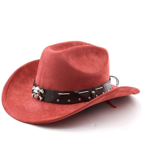 Close-up of red suede cowboy hat with black leather band featuring silver skull studs