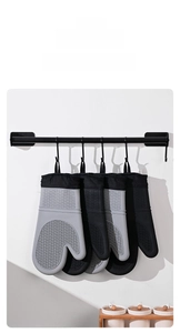 Hanging heat-resistant silicone kitchen glove in dark grey with anti-slip wave texture