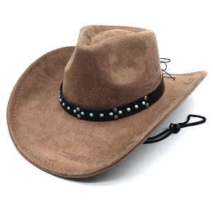 Detail der Western-Wildleder-Cowboyhut mit Türkisperlen und schwarzem Windband
