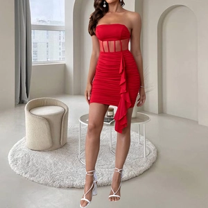 Detailed view of red tube top mini dress featuring mesh patchwork and side ruffles