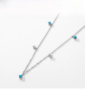 Macro view of S925 sterling silver chain featuring turquoise beads and square diamonds