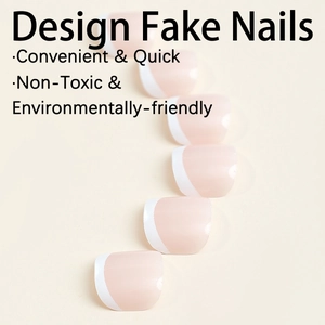 Classic french nude press-on toenails with white tips in a minimalist arrangement
