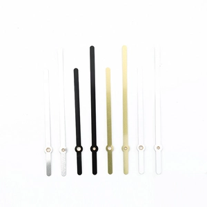 DIY wall clock hands in gold, silver, black, and white colors made of aluminum