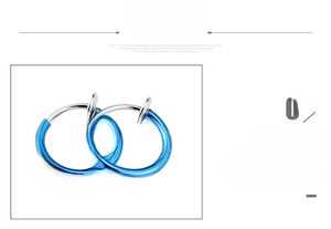 Detail view of blue stainless steel spring clip earrings with smooth non-pierced hoops