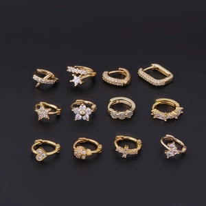 Set of 12 golden stud earrings with heart and star patterns inlaid with sparkling zircon