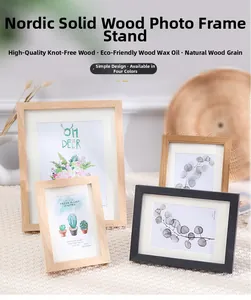 Detail of four natural solid wood picture frames with high quality wood grain finish