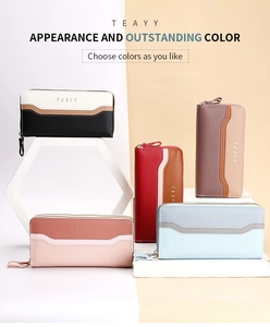 Detailed display of long color-block wallets with gold lettering on geometric stands