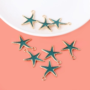 Starfish charms for jewelry making with green enamel and gold-plated metal finish