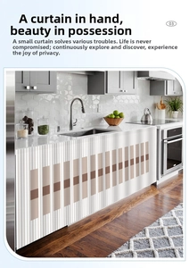 Detail of adhesive dustproof cabinet curtain with beige stripes and geometric patterns