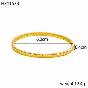Detail view of 18K gold plated stainless steel cuff bracelet with size and weight specs