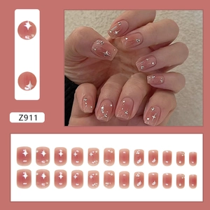 Detail view of pink jelly press-on nails Z911 with silver stars and tiny rhinestones