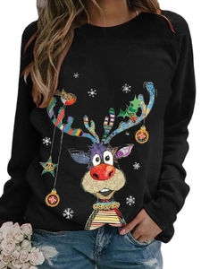 Detail of colorful Christmas reindeer and snowflake print on a black crewneck sweatshirt