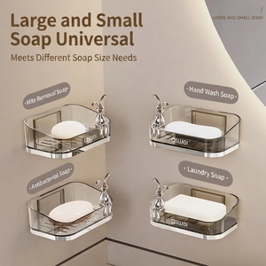 Wall-mounted grey draining soap holders with decorative silver rabbit accents