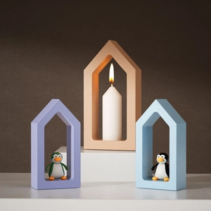 Minimalist house shape silicone mold for Easter candle making with DIY penguin decor