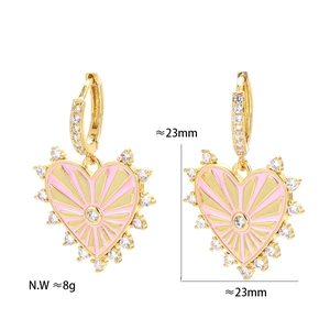 Pink heart enamel earrings with gold plating and zircon border in professional studio shot