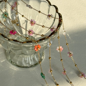 Colorful floral titanium steel necklace and bracelet set with translucent beads in soft light