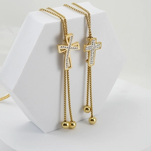 Long 18K gold plated cross pendant necklace with sparkling cubic zirconia on box chain