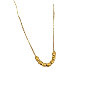 Elegant gold plated titanium steel necklace featuring minimalist polished oval beads