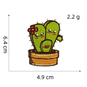 Detail view of cartoon cactus embroidery patch with dimensions 6.4cm by 4.9cm
