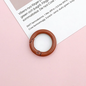 Detail view of a 25mm terracotta matte spring ring clasp for DIY jewelry making