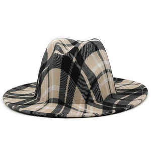Detail of the tartan plaid pattern and texture on a 9.5cm wide brim wool felt fedora hat