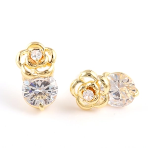 Boucles d'oreilles roses creuses dorées élégantes avec cristaux de zircon ronds