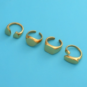 Set of four minimalist gold geometric open rings featuring heart, square, and oval shapes