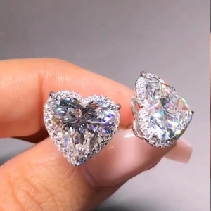 Minimalist silver heart-shaped halo stud earrings with brilliant zircon stones