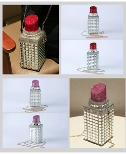 Detail of crystal lipstick shaped clutch bag with red and pink rhinestones and gold chain
