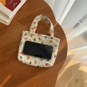 Quilted floral mini tote bag with bear print and phone for size reference