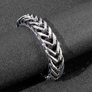 Men's V-shaped stainless steel woven chain bracelet with punk style silver finish
