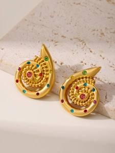 Detail of 18k gold plated spiral earrings featuring vibrant multi-colored inlaid gemstones