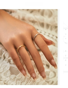 Detailed close-up of S925 silver rings with baguette stones and foil texture finish