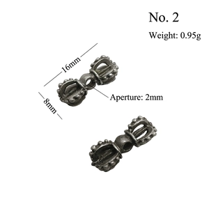 Macro detail of 16mm retro silver Vajra beads with 2mm hole for DIY jewelry making